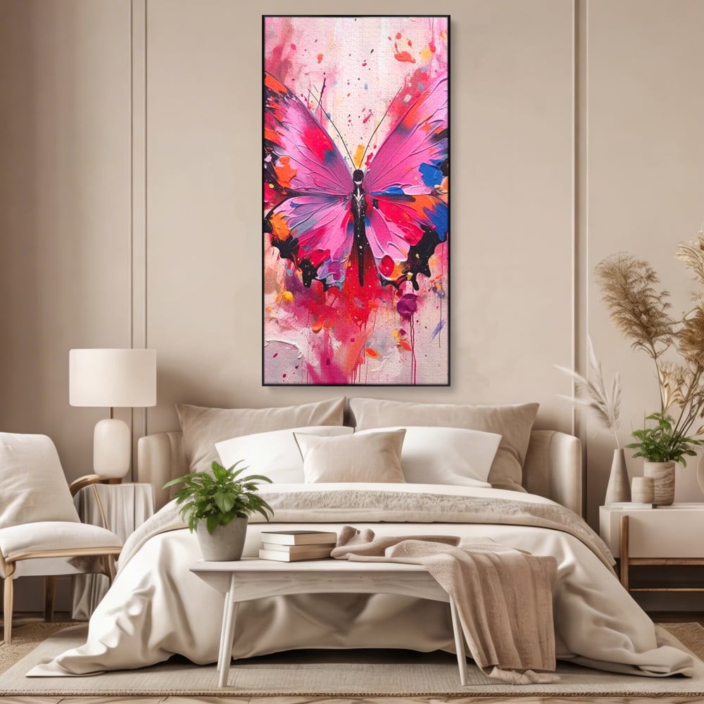 Tablou canvas cu pictura digitala cu fluture roz, in rama de aluminiu negru, pe perete intr-un dormitor